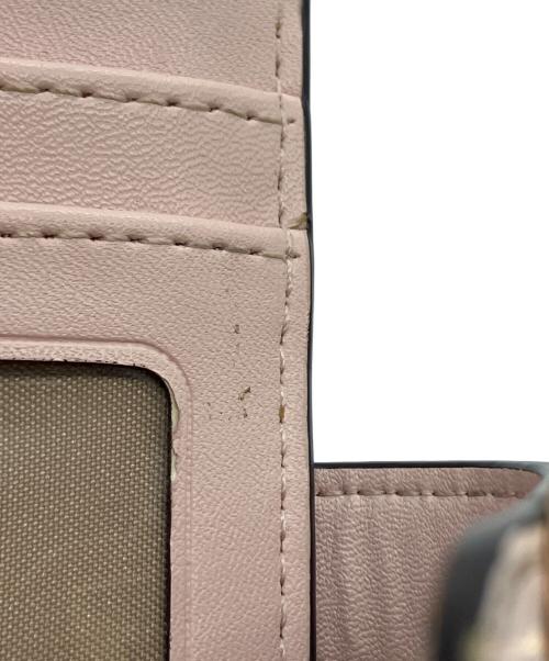 MICHAEL KORS（マイケルコース）MICHAEL KORS (マイケルコース) 2つ折り財布 ピンクの古着・服飾アイテム