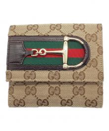 GUCCI（グッチ）の古着「2つ折り財布　GGシェリーライン ホースビット」｜ベージュ×ブラウン