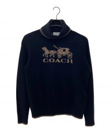 COACH（コーチ）の古着「ハイネックニット」｜ブラック