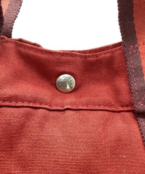 HERMES（エルメス）HERMES (エルメス) キャンバストートバッグ レッドの古着・服飾アイテム