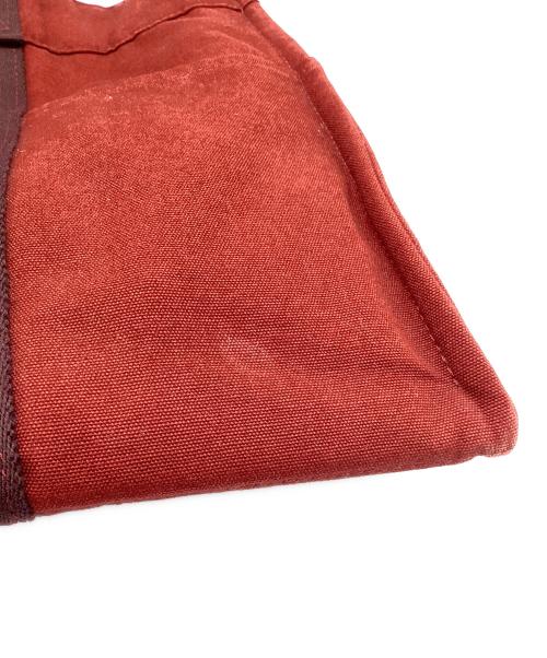 HERMES（エルメス）HERMES (エルメス) キャンバストートバッグ レッドの古着・服飾アイテム