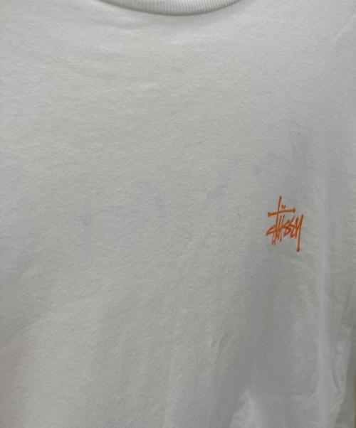 stussy（ステューシー）stussy (ステューシー) 長袖カットソー ホワイト×オレンジ サイズ:Mの古着・服飾アイテム
