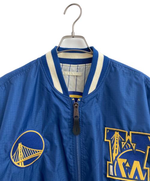 ALPHA INDUSTRIES（アルファインダストリーズ）ALPHA INDUSTRIES (アルファインダストリーズ) New Era (ニューエラ) NBA (エヌビーエー) ボンバージャケット　L-2B Bomber Jacket ブルー×アイボリー サイズ:XLの古着・服飾アイテム