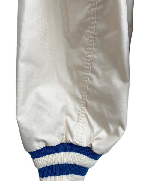 ALPHA INDUSTRIES（アルファインダストリーズ）ALPHA INDUSTRIES (アルファインダストリーズ) New Era (ニューエラ) NBA (エヌビーエー) ボンバージャケット　L-2B Bomber Jacket ブルー×アイボリー サイズ:XLの古着・服飾アイテム