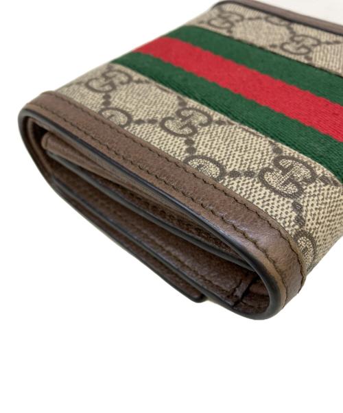 GUCCI（グッチ）GUCCI (グッチ) 2つ折り財布　GG ブラウンの古着・服飾アイテム