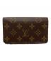 LOUIS VUITTON（ルイ ヴィトン）の古着「2つ折り財布」｜ブラウン