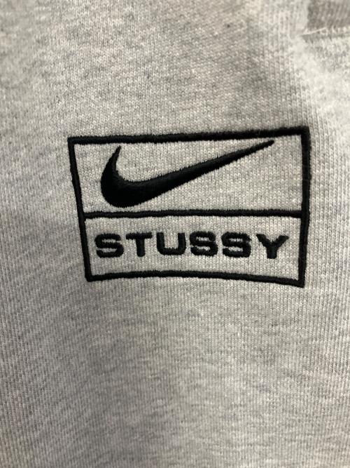 NIKE（ナイキ）NIKE (ナイキ) stussy (ステューシー) スウェットパンツ グレー サイズ:XL 未使用品の古着・服飾アイテム