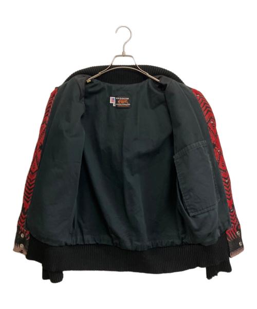 skookum（スクーカム）skookum (スクーカム) スタジャン レッド×ブラック サイズ:38の古着・服飾アイテム