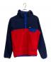 Patagonia（パタゴニア）の古着「シンチラスナップT」｜ブルー×レッド