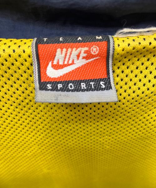 NIKE（ナイキ）NIKE (ナイキ) 90'sカレッジナイロンジャケット ネイビー×イエロー サイズ:不明の古着・服飾アイテム