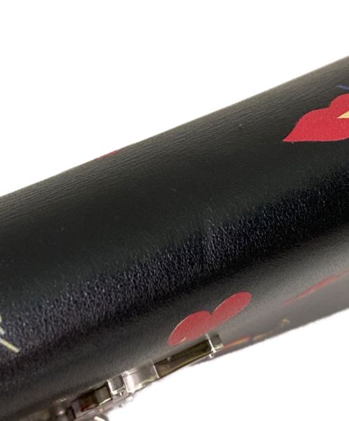 Saint Laurent Paris（サンローランパリ）Saint Laurent Paris (サンローランパリ) ケイトタッセルチェーンウォレット ブラック×レッドの古着・服飾アイテム