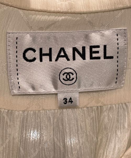CHANEL（シャネル）CHANEL (シャネル) Coco Button Silk Blouse ホワイト サイズ:34の古着・服飾アイテム
