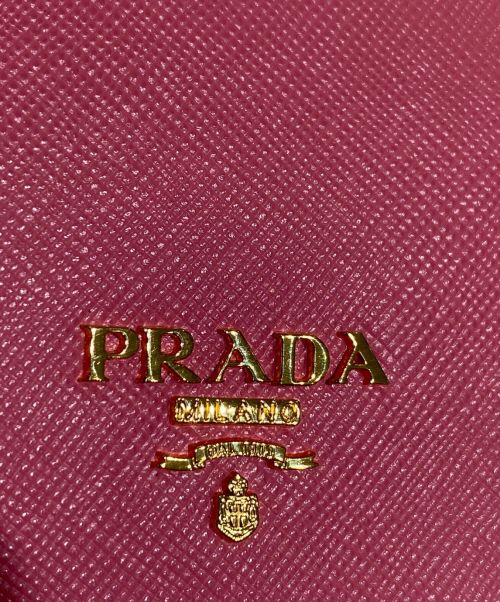 PRADA（プラダ）PRADA (プラダ) サフィアーノコンパクトウォレット ピンクの古着・服飾アイテム