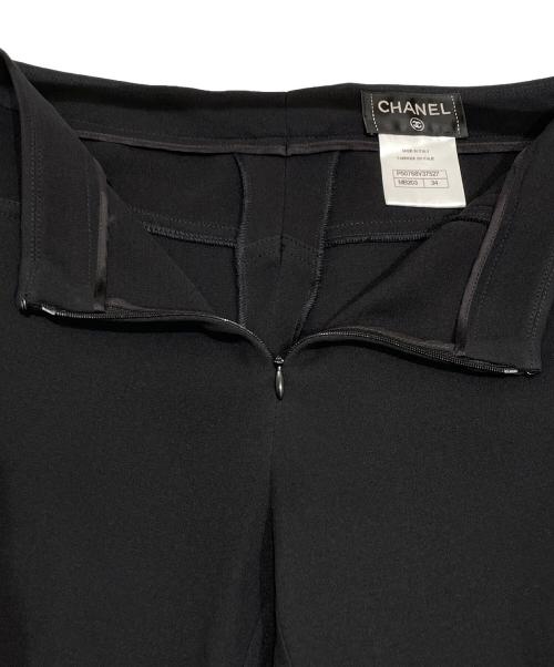 CHANEL（シャネル）CHANEL (シャネル) アンクルボタンシルクパンツ ブラック サイズ:34の古着・服飾アイテム