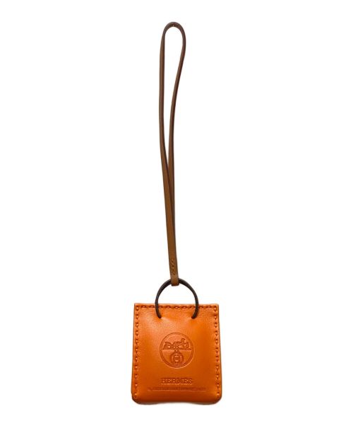 HERMES（エルメス）HERMES (エルメス) サック オランジュ チャーム オレンジの古着・服飾アイテム