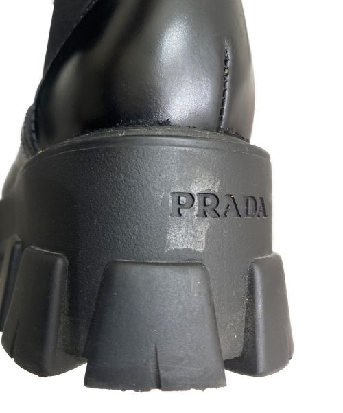 PRADA（プラダ）PRADA (プラダ) モノリス ポーチ付 ブラッシュドレザーx Re-Nylon ブーツ ブラック サイズ:38の古着・服飾アイテム