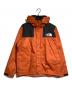 THE NORTH FACE（ザ ノース フェイス）の古着「マウンテンパーカー」｜オレンジ