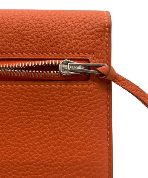 HERMES（エルメス）HERMES (エルメス) ドゴンロングウォレット/財布 オレンジの古着・服飾アイテム