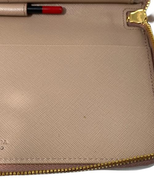 PRADA（プラダ）PRADA (プラダ) ラウンドファスナー長財布 ベージュの古着・服飾アイテム