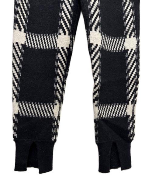 MYLAN（マイラン）MYLAN (マイラン) カシミヤニットフレアトップ/ジャガーニットパンツ （セットアップ） ホワイト×ブラック サイズ:freeの古着・服飾アイテム