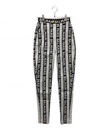 BALMAIN（バルマン）の古着「ストライプロゴスリムパンツ」｜ホワイト