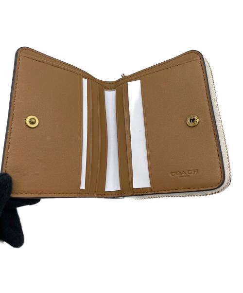 COACH（コーチ）COACH (コーチ) 2つ折り財布 ビルフォールドウォレット  アイボリーの古着・服飾アイテム