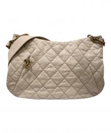 CHANELシャネル）の古着「ココプリーツショルダーバッグ」｜アイボリー