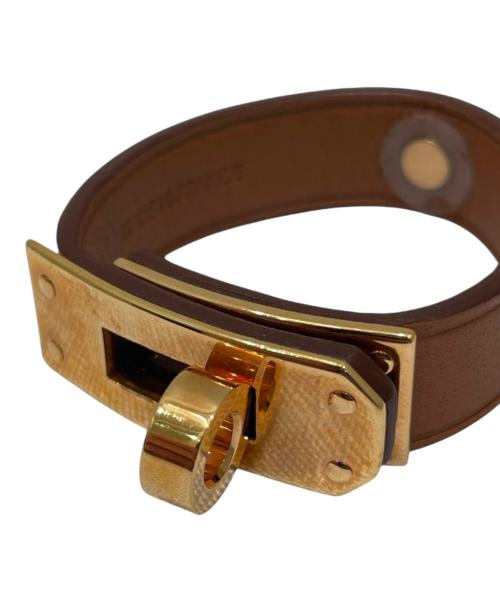 HERMES（エルメス）HERMES (エルメス) ケリーグローブホルダー ブラウン×ゴールド金具の古着・服飾アイテム