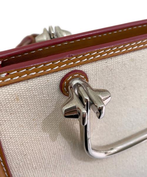 ALEXANDER McQUEEN（アレキサンダーマックイーン）ALEXANDER McQUEEN (アレキサンダーマックイーン) ショートストーリー ベージュの古着・服飾アイテム