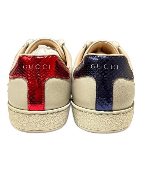 GUCCI（グッチ）GUCCI (グッチ) フレイムエンブレムローカットスニーカー ベージュ サイズ:6の古着・服飾アイテム