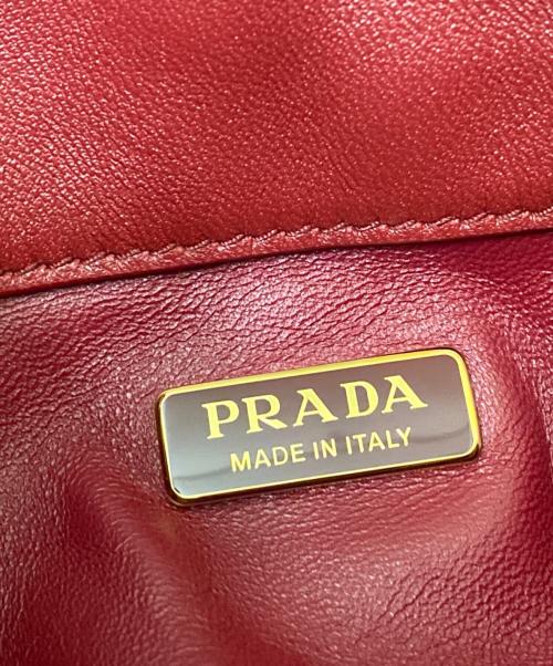 PRADA（プラダ）PRADA (プラダ) プチ サックRe-Nylon xナッパレザーミニバケットバッグ レッドの古着・服飾アイテム