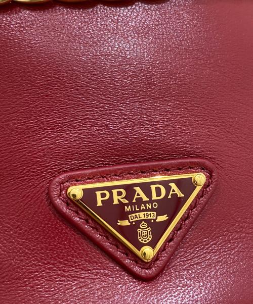PRADA（プラダ）PRADA (プラダ) プチ サックRe-Nylon xナッパレザーミニバケットバッグ レッドの古着・服飾アイテム