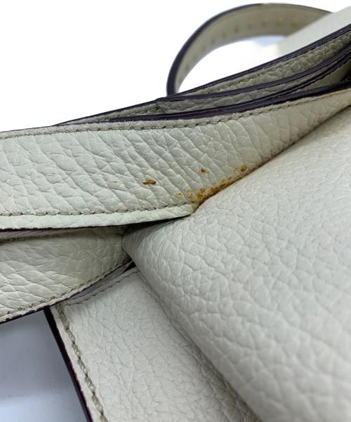 TOD'S（トッズ）TOD'S (トッズ) ウェーブショルダーバッグ アイボリーの古着・服飾アイテム