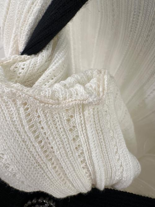 CHANEL（シャネル）CHANEL (シャネル) ライオンボタンカーディガン ホワイト サイズ:36の古着・服飾アイテム