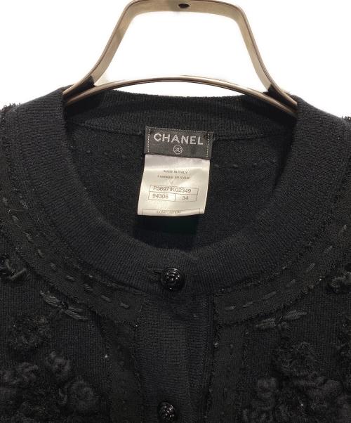 CHANEL（シャネル）CHANEL (シャネル) カメリア スパンコール ボレロニットカーディガン ブラック サイズ:34の古着・服飾アイテム