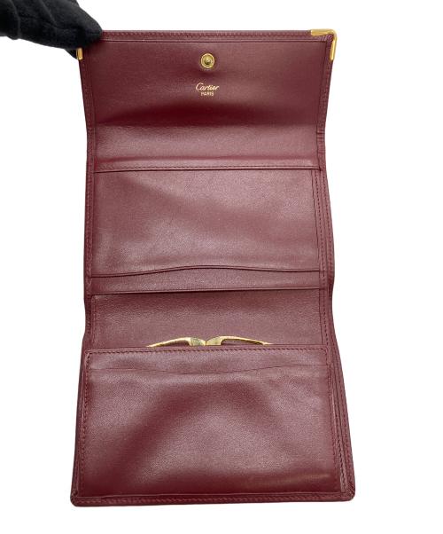 Cartier（カルティエ）Cartier (カルティエ) マストライン 3つ折り財布 ボルドーの古着・服飾アイテム