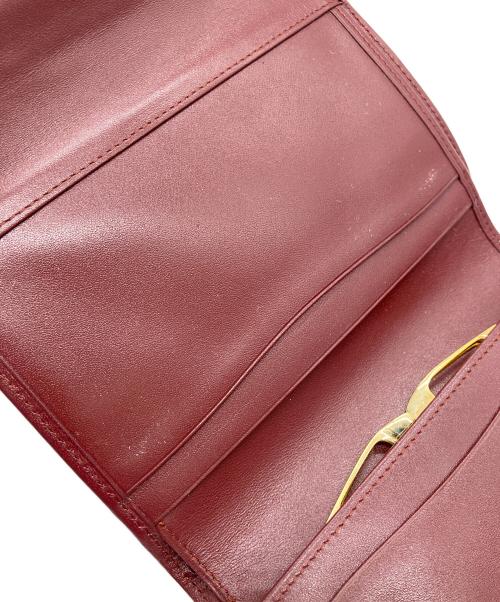 Cartier（カルティエ）Cartier (カルティエ) マストライン 3つ折り財布 ボルドーの古着・服飾アイテム