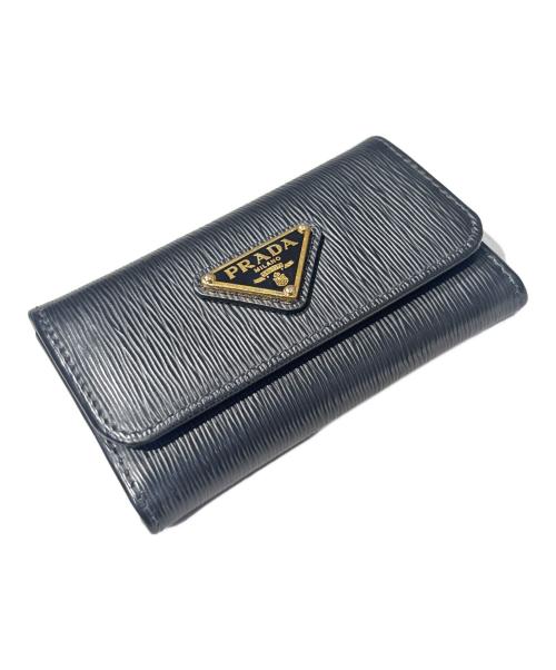 PRADA（プラダ）PRADA (プラダ) 三角 サフィアーノ ロゴ 6連 キーケース ブラックの古着・服飾アイテム