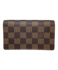 LOUIS VUITTON（ルイ ヴィトン）の古着「2つ折り財布」｜ブラウン