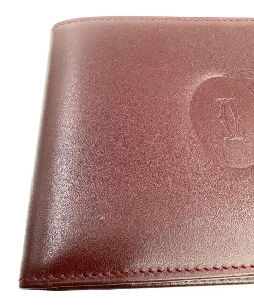 Cartier（カルティエ）Cartier (カルティエ) 2つ折り財布 ボルドーの古着・服飾アイテム