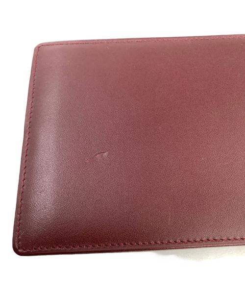 Cartier（カルティエ）Cartier (カルティエ) 2つ折り財布 ボルドーの古着・服飾アイテム