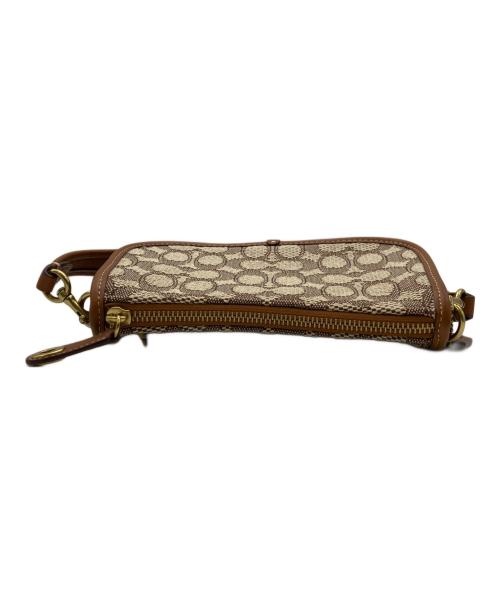 COACH（コーチ）COACH (コーチ) Disney (ディズニー) ミニハンドバッグ ブラウンの古着・服飾アイテム