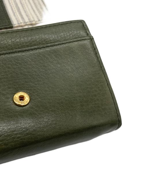 moz（モズ）moz (モズ) 2つ折り財布 オリーブの古着・服飾アイテム