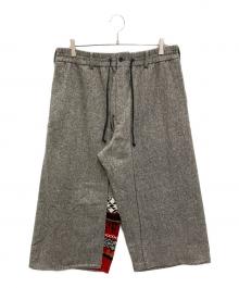 s'yte（サイト）の古着「ETERMINE NEP TWEED + NORDIC PATTERN KNIT WRAP PANTS」｜グレー