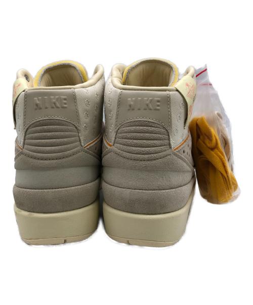 NIKE（ナイキ）NIKE (ナイキ) スニーカー アイボリー×グレー サイズ:24.5の古着・服飾アイテム