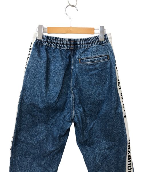 ALEXANDER WANG（アレキサンダー・ワン）ALEXANDER WANG (アレキサンダーワン) サイドラインデニムパンツ ブルー サイズ:XSの古着・服飾アイテム