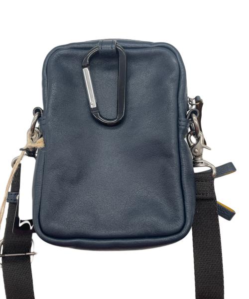 IKETEI（イケテイ）IKETEI (イケテイ) レザーポーチ ネイビーの古着・服飾アイテム