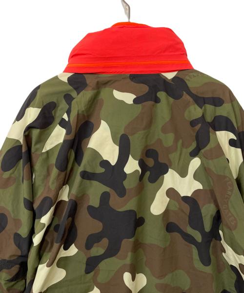 PEARLY GATES（パーリーゲイツ）PEARLY GATES (パーリーゲイツ) ゴルフウェア(トップス) オリーブ×オレンジ サイズ:5の古着・服飾アイテム