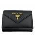 PRADA（プラダ）の古着「コンパクトウォレット」｜ブラック