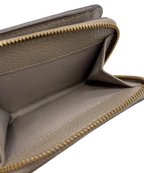 TORY BURCH（トリーバーチ）TORY BURCH (トリーバーチ) コンパクトウォレット グレージュの古着・服飾アイテム